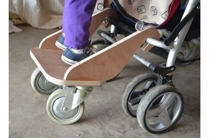 skateboard attached to stroller